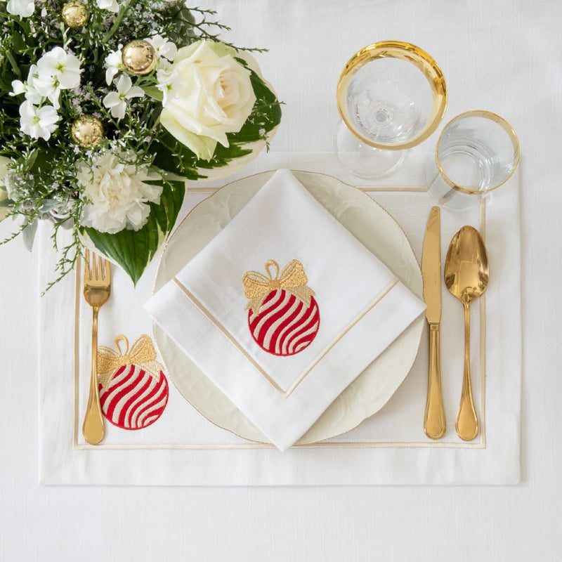 Roseberry Home Bauble napkins with  folded on plate.