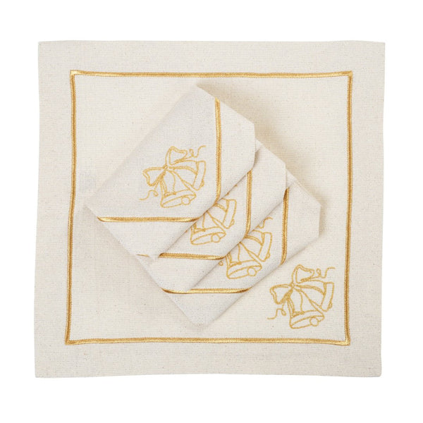 Folded light beige napkin with embroidered Christmas bell design on white background.