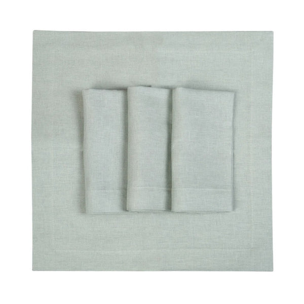 Set of 6 light green linen napkins by Roseberry Home neatly folded on white background, sold at Amiramour.