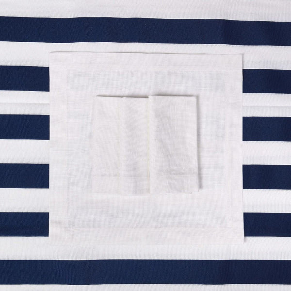 White Panama Napkins by Roseberry Home on navy striped tablecloth