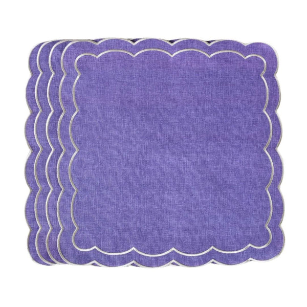 Purple Petali embroidered napkins with wave border on white background.