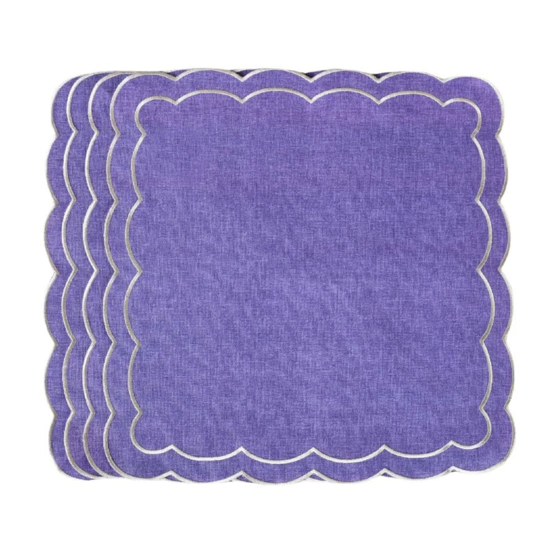 Purple Petali embroidered napkins with wave border on white background.