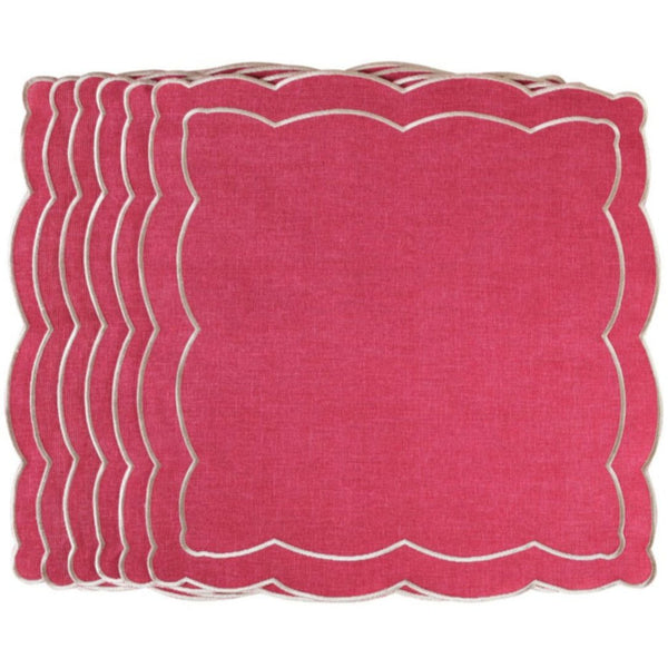 Magenta cotton napkins with irregular wave-shaped border with embroidery along the edges.