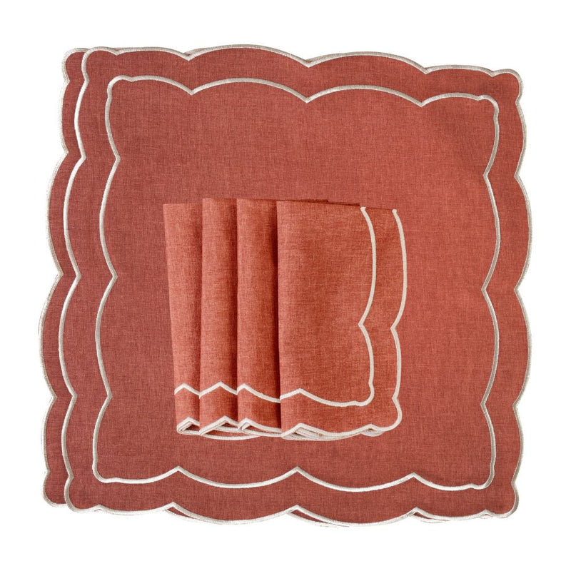 Set of 6 Rust Onde embroidered cotton napkins by Roseberry Home, folded on white background.