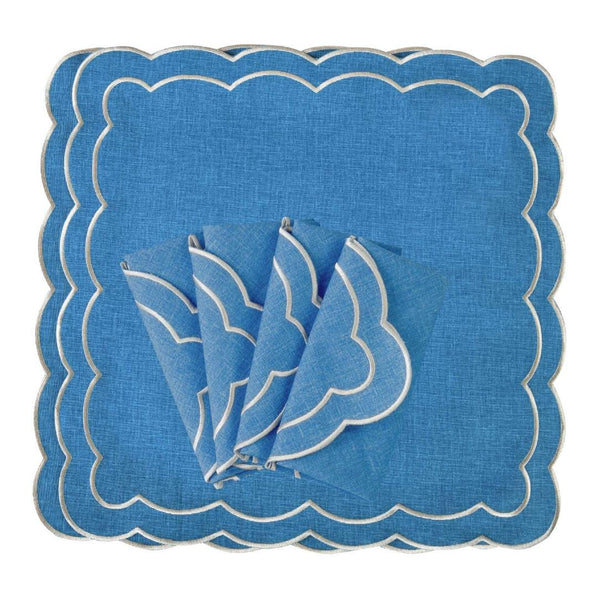 Set of six Blue Petali napkins with wave borders on white background, sold at Amiramour.