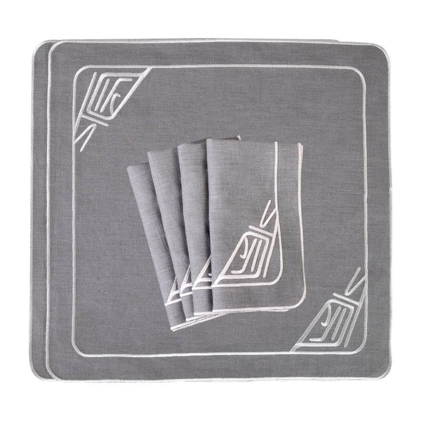 Folded Infinity embroidered grey linen napkin by Roseberry Home, sold at Amiramour.