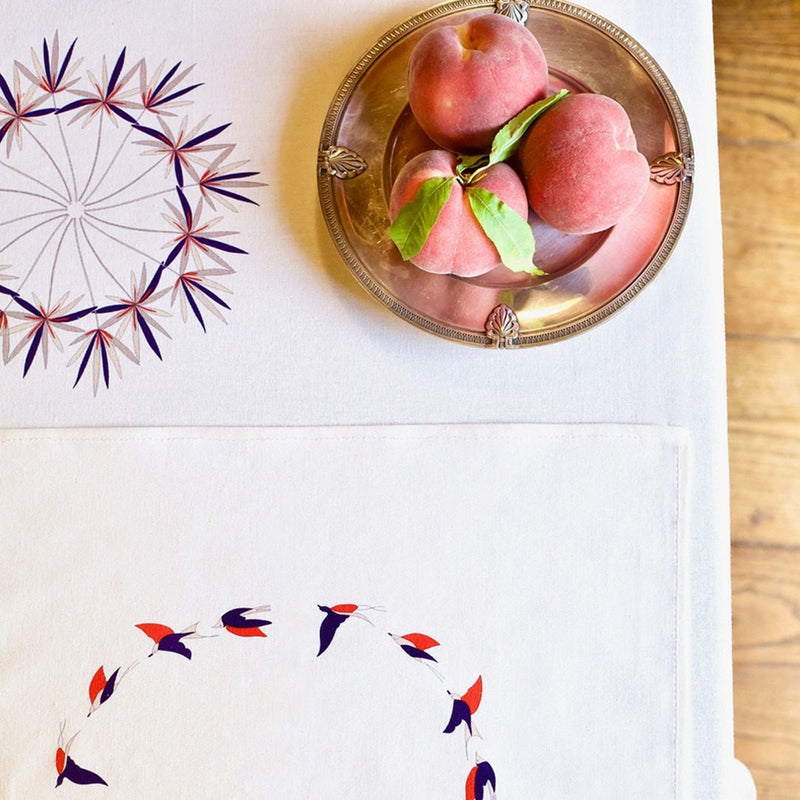 Close-up of red and blue birds print on Baba a la Grenade napkin by Alto Duo, Amiramour