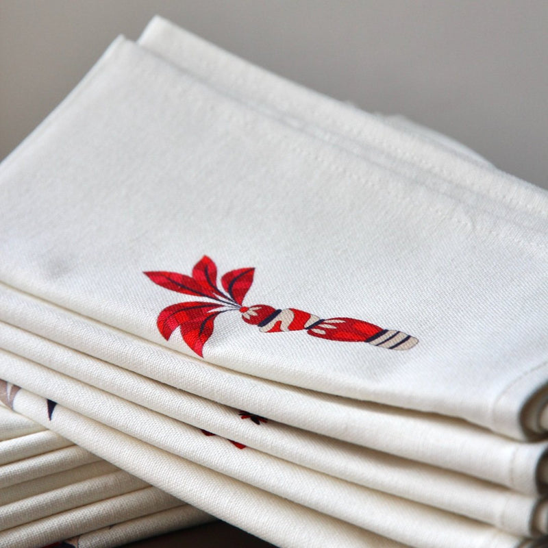 Close-up of red and blue plant print on Baba a la Grenade napkin ,Alto Duo, Amiramour