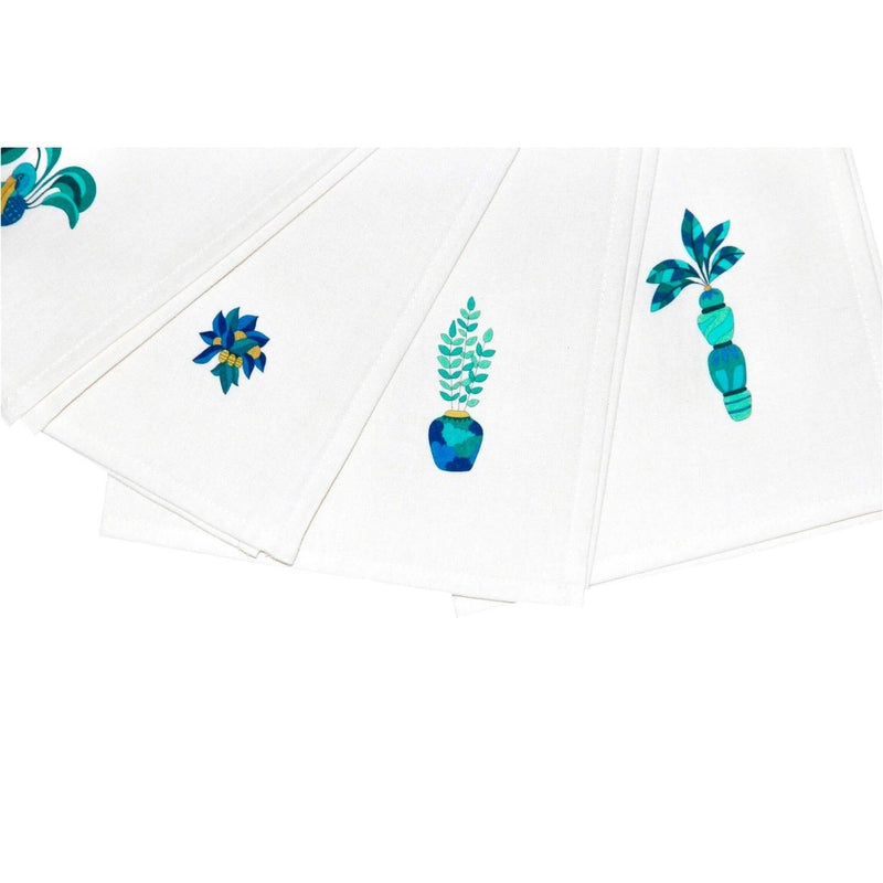 Close-up of green and blue prints on Baba a la Grenade napkins by Alto Duo, Amiramour