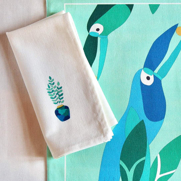Close-up of green and blue plant print on Baba a la Grenade napkin ,Alto Duo, Amiramour