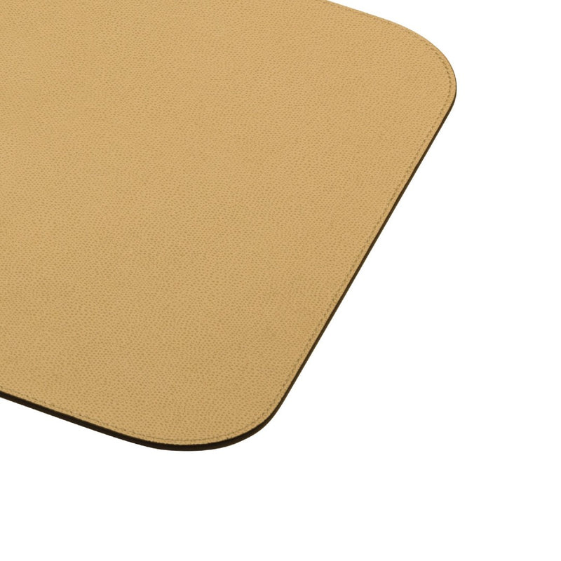 Vanny leather placemat in tan brown with one stitching row by Giobagnara close-up.