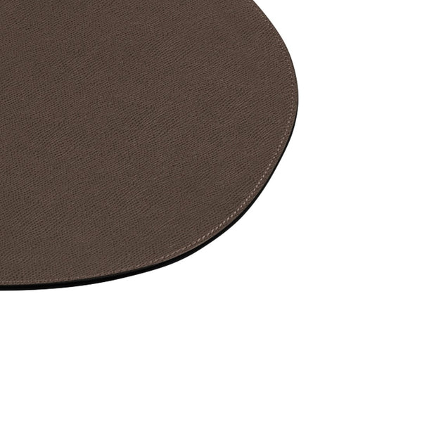 Oval leather dark brown placemat with single-stitch detail close-up.