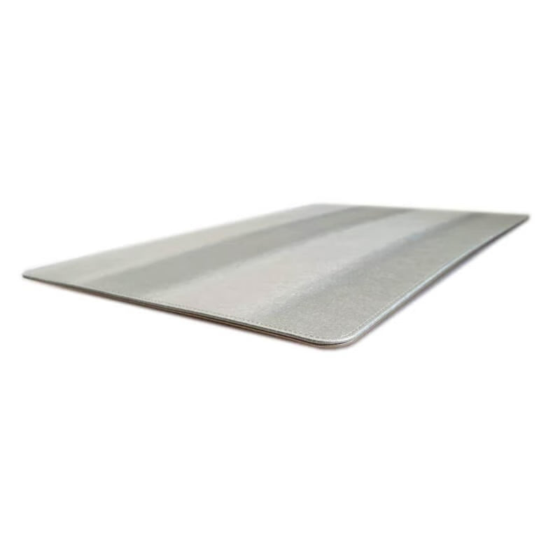 Rectangular reversible placemat in silver and gold, silver side horizontal view.