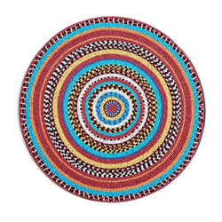 Luxury beaded placemat with Maasai-inspired design by Von Gern Home.