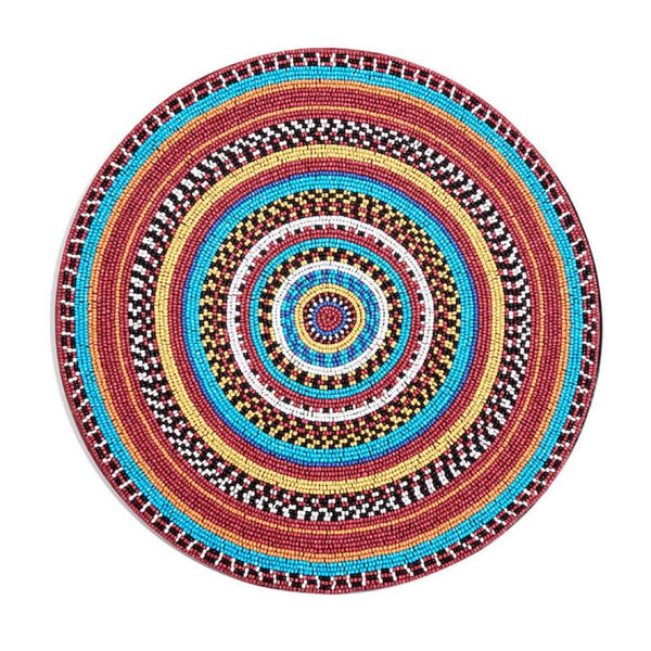 Luxury beaded placemat with Maasai-inspired design by Von Gern Home.