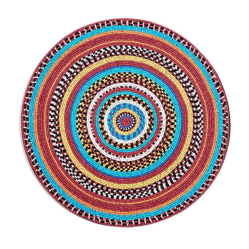 Luxury beaded placemat with Maasai-inspired design by Von Gern Home.