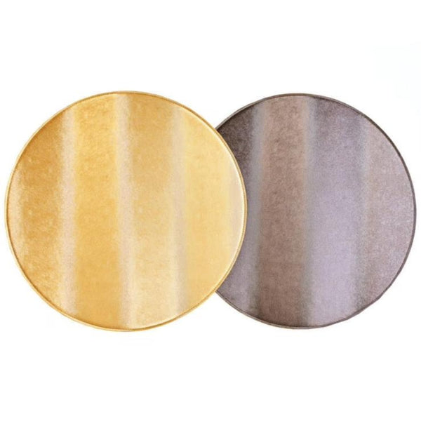 Reversible faux leather placemat in rose gold and bronze by Von Gern Home.
