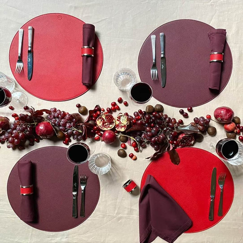 Reversible placemat in red and burgundy faux leather styled evening tablescape.