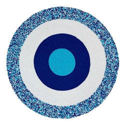 Blue hand-beaded placemat with geometric circle pattern by Von Gern Home.