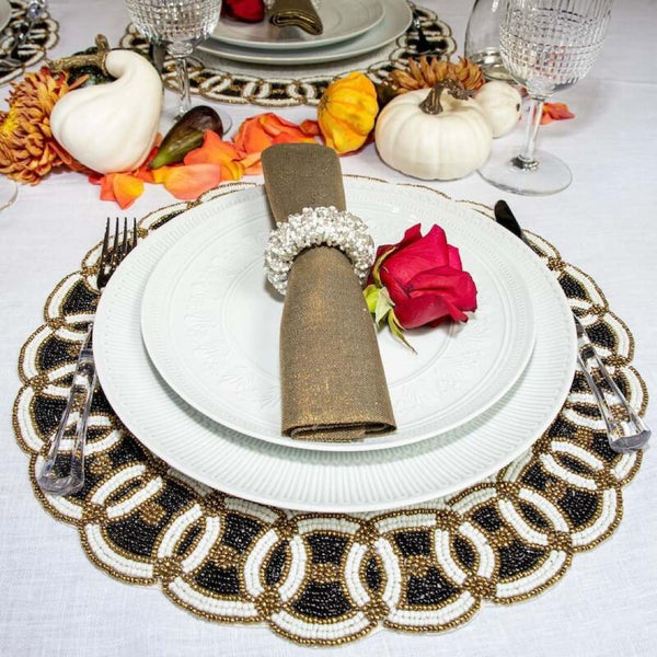 Coco white and black hand-beaded placemats by Von Gern Home side view.