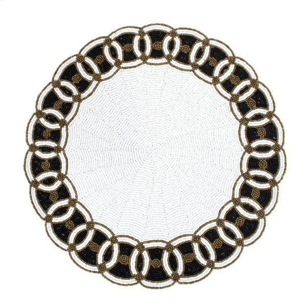 Coco white and black hand-beaded placemats by Von Gern Home.