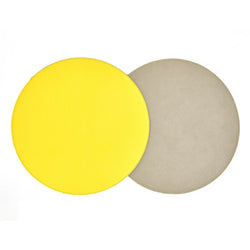 Reversible placemat in yellow and gray faux leather by Von Gern Home.