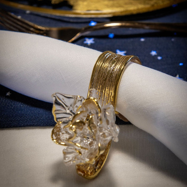 Little Rose borosilicate glass napkin ring with gold foil detailing by Casarialto, styled on white napkin.