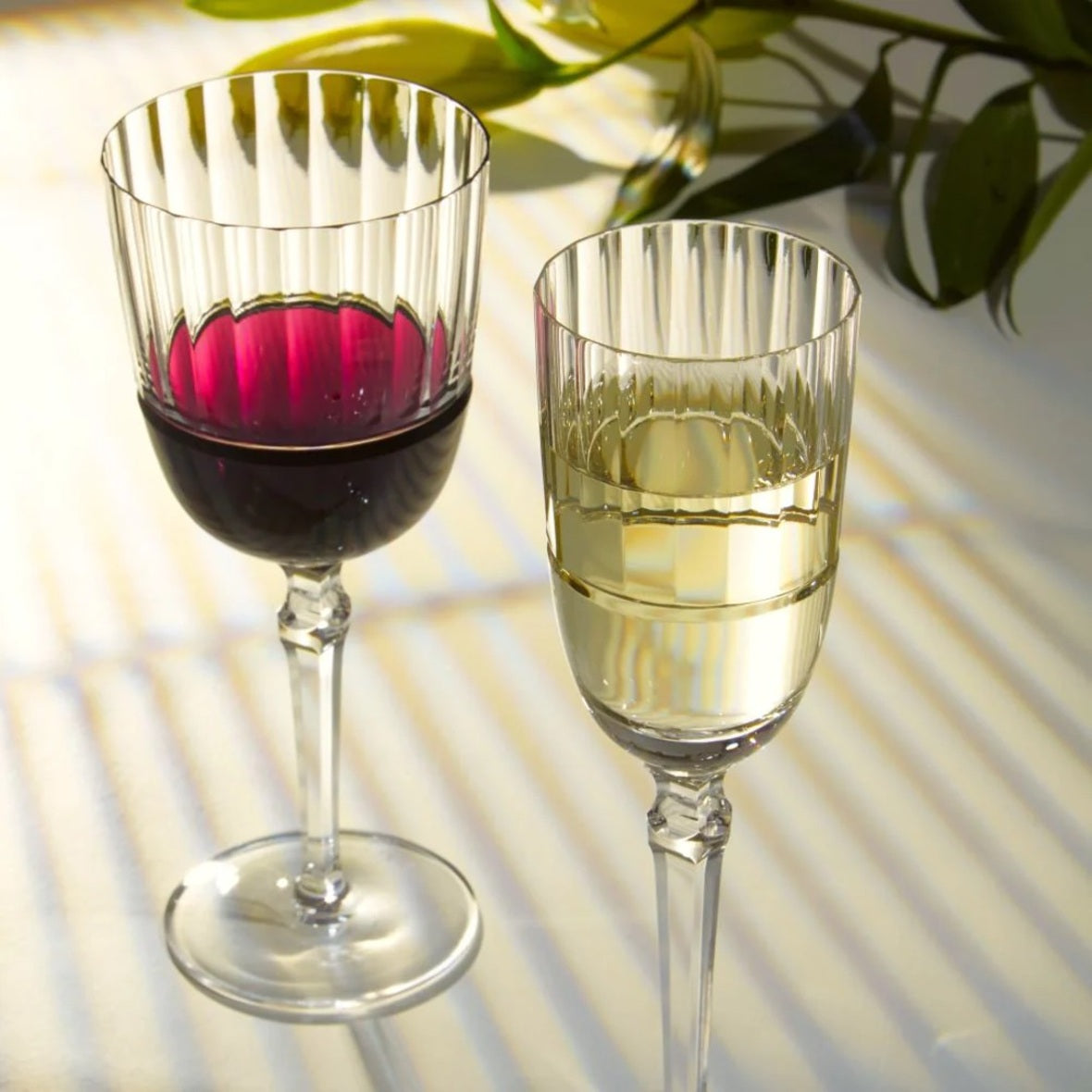 Styled Glasses Alya collection by Cristallerie de Montbronn with modern cut design in crystal.