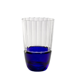 Alya highball tumbler in dark blue crystal with vertical cuts by Cristallerie de Montbronn.