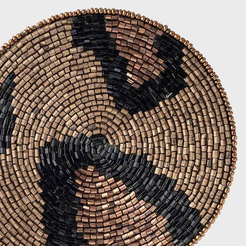 Joanna Buchanan bronze animal print coaster close-up on its bead work.