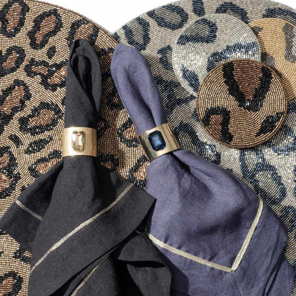 Joanna Buchanan bronze animal print coasters on atching placemats