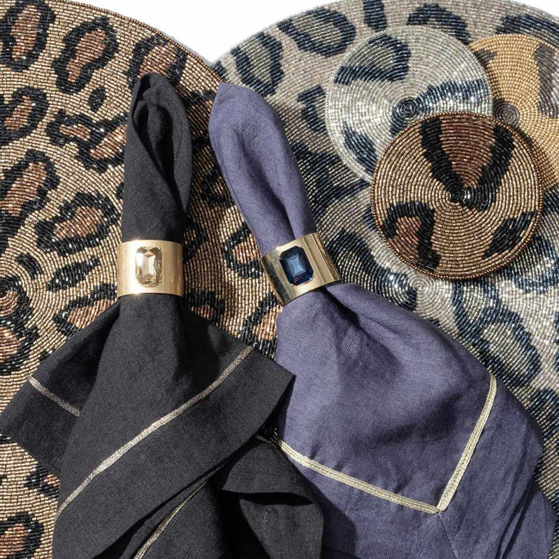 Joanna Buchanan bronze animal print coasters on atching placemats