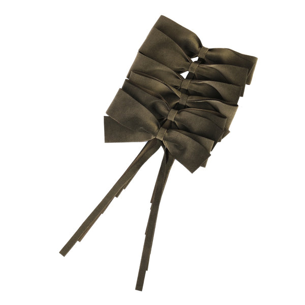 Brown velvet bows napkin rings by Roseberry Home shown on white background.