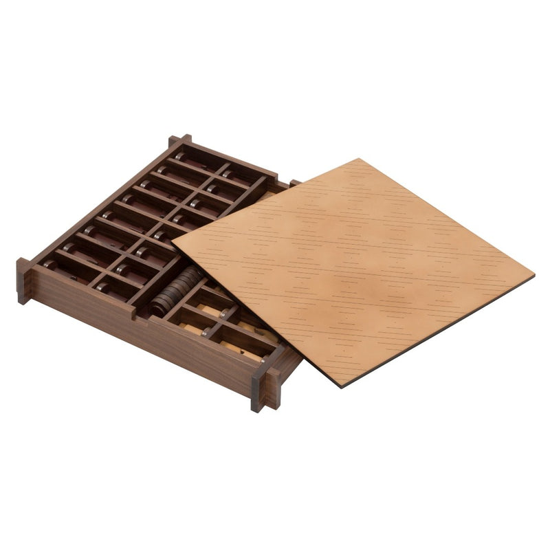 Open Structura Triple Game Box by Giobagnara in walnut and sole leather showing compartments for chess and draughts pieces.