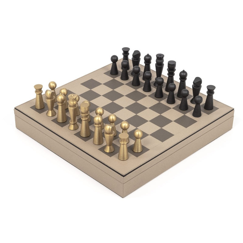 Chess & Checkers Game Board by Pinetti displayed with brass and black chess pieces on taupe grained leather surface.
