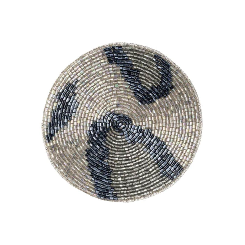 Round beaded coaster with blue and silver pattern on a white background