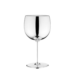 A silver-plated balloon glass with a rounded bowl and a slender stem, standing upright against a white background.