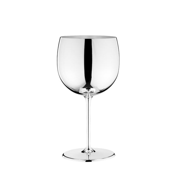 A silver-plated balloon glass with a rounded bowl and a slender stem, standing upright against a white background.