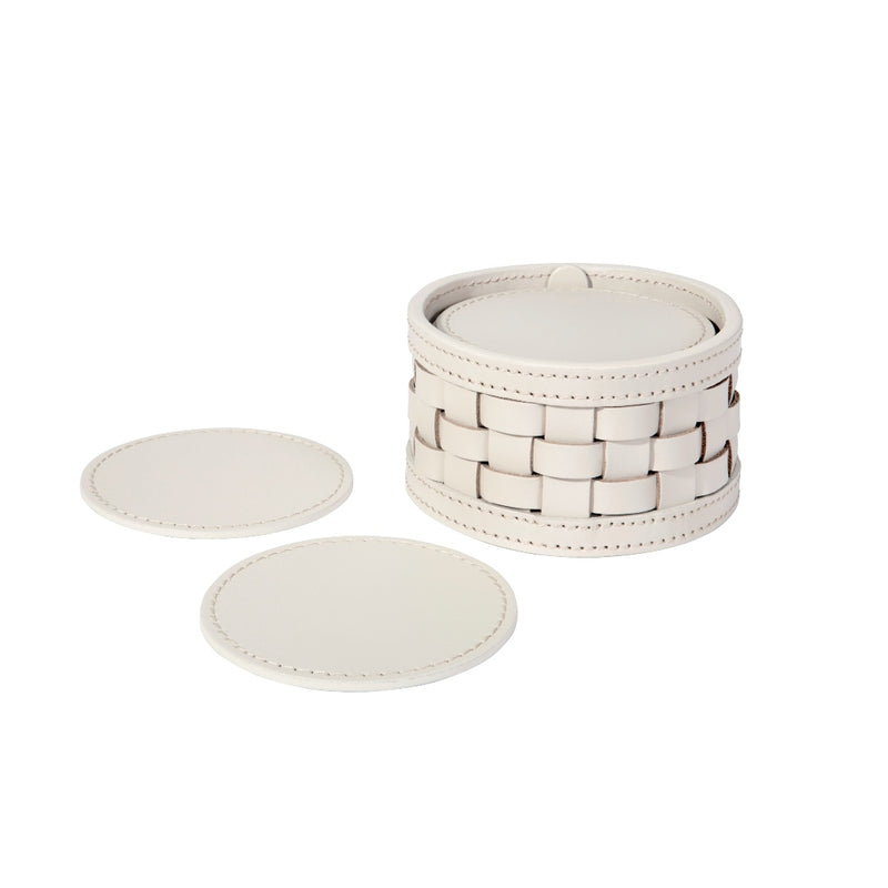 Set of Barcellona ivory coasters with a round holder on a white background