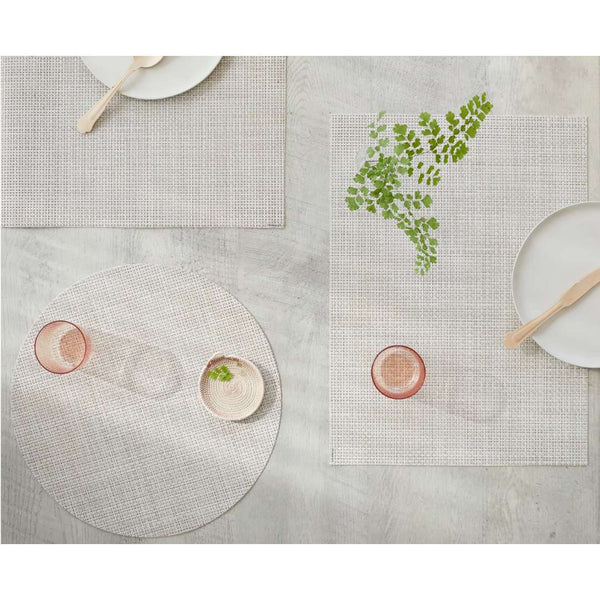 Placemats with different designs on a neutral background