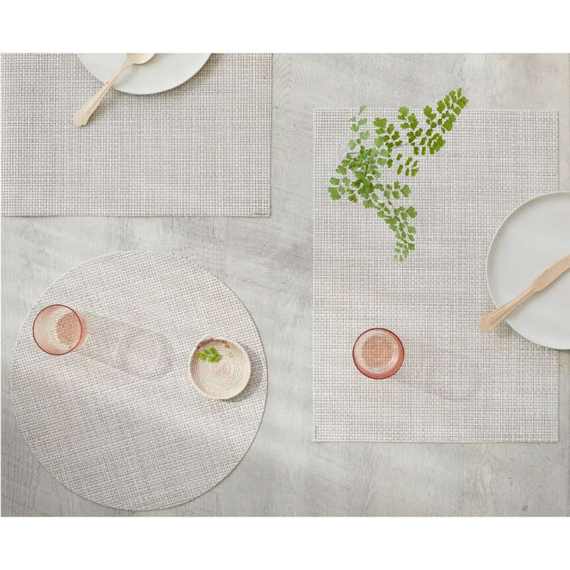 Placemats with different designs on a neutral background