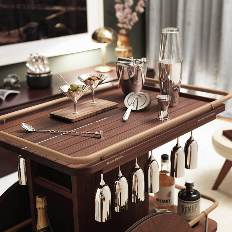 Wooden bar cart with cocktail-making tools and Belvedere silver-plated snackbar by Robbe & Berking