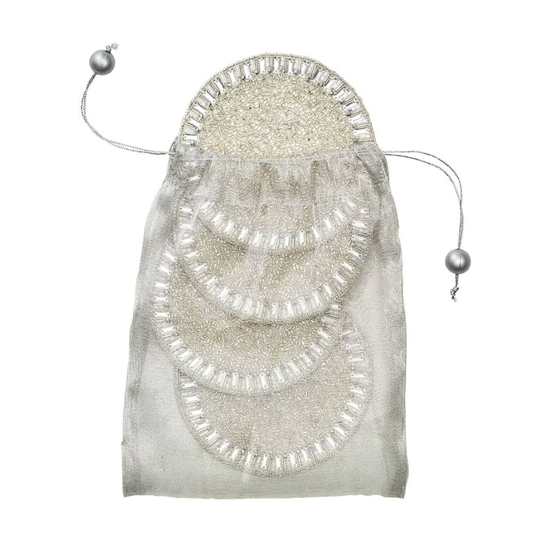 Decorative silver pouch with beaded design coasters on a white background