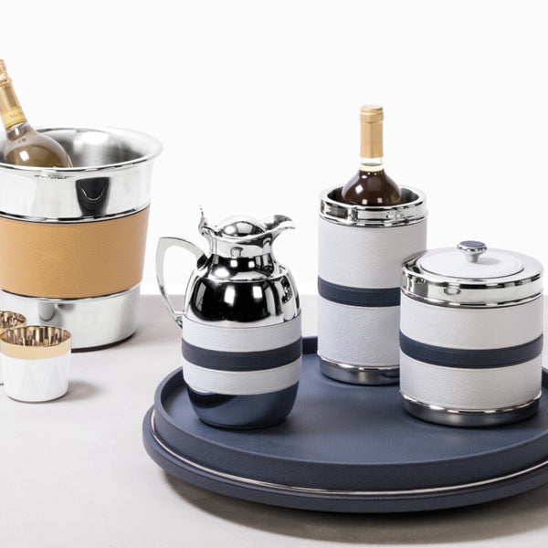Styled luxury bicolor insulated carafe by Giobagnara in chrome-plated brass with Wild Boar printed calfskin leather – handcrafted Italian design.