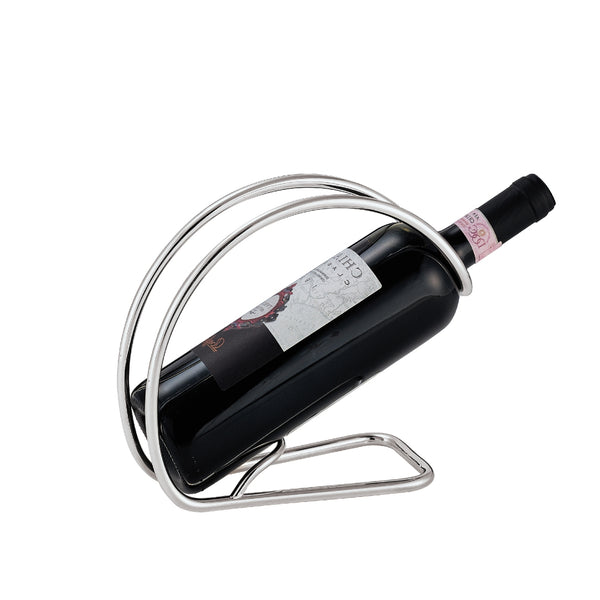 A silver plated bottle holder by Greggio, designed to hold a bottle elegantly, with a focus on the sleek, curved metallic structure.