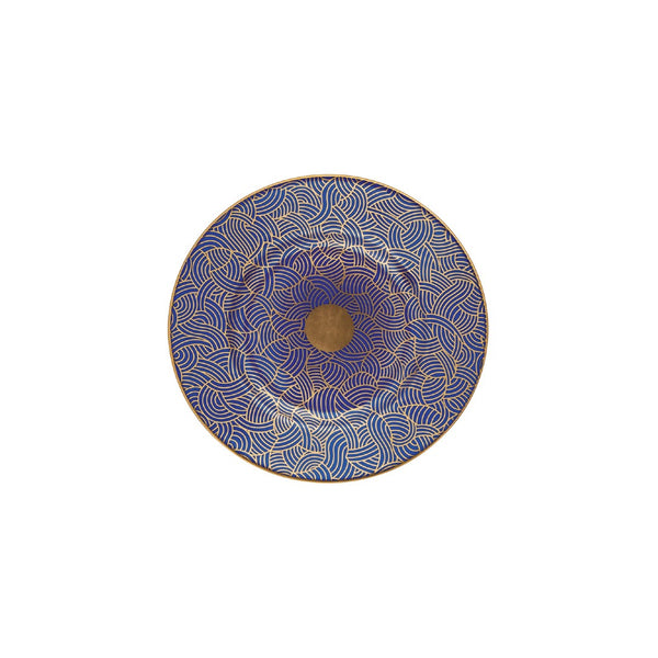 A round porcelain bread and butter plate with a geometric pattern featuring cobalt blue and gold accents.