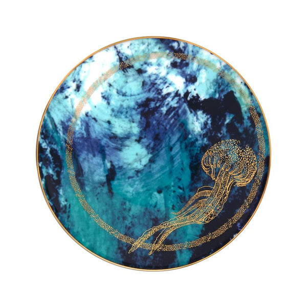 Decorative plate with a jellyfish design on a blue and gold background