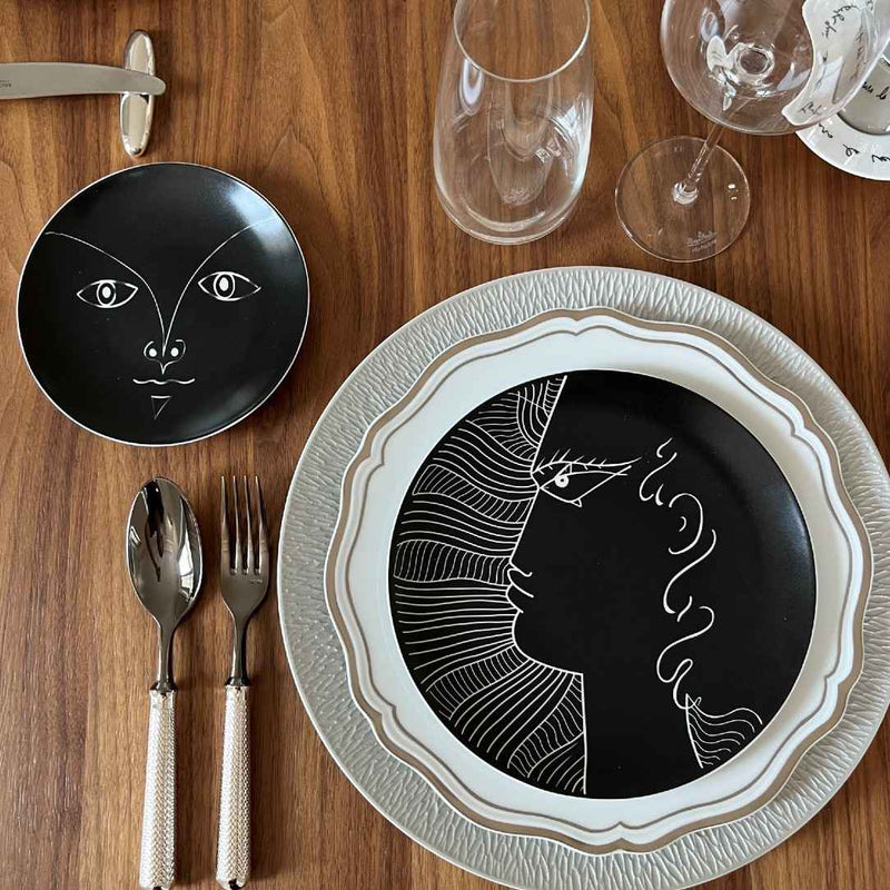 Elegant setting withporcelain bread plate with Visage d’enfant motif Raynaud