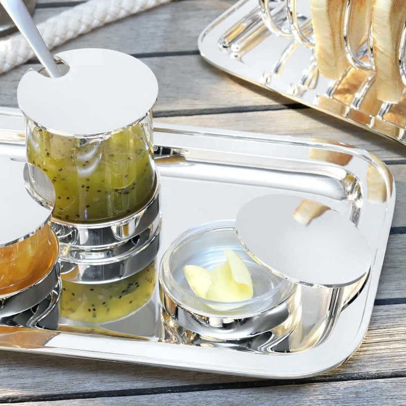 Silver-plated butter dish with crystal base by Robbe & Berking on a wooden surface