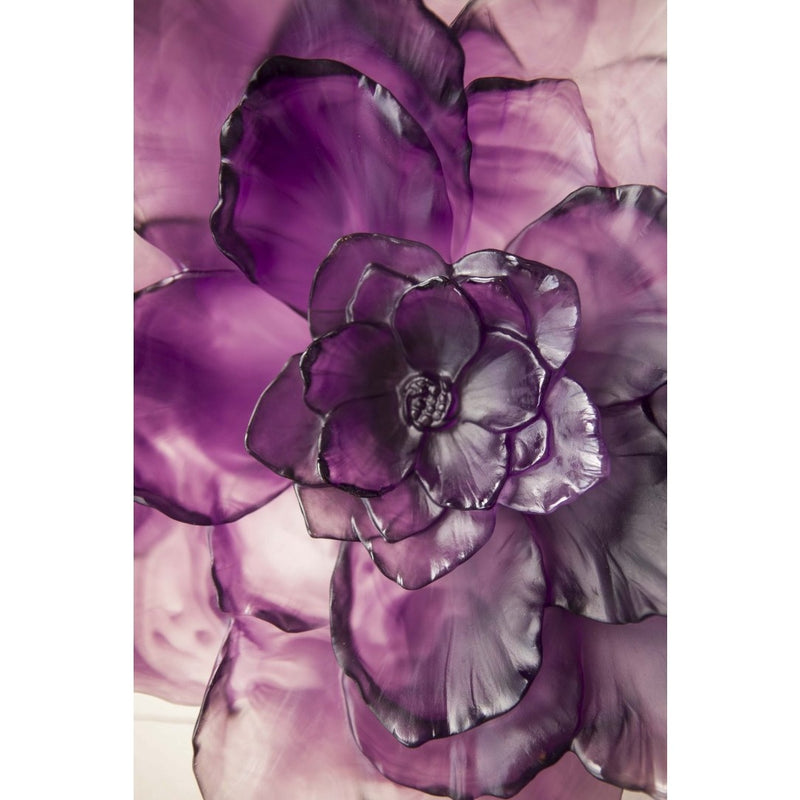 Close-up of a purple floral design on a white background